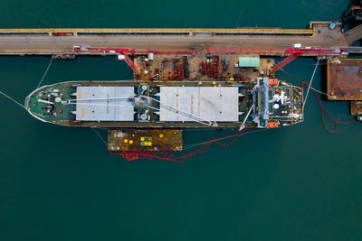 High angle view of ship moored at harbor