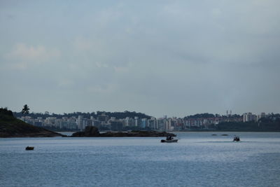 Scenic view of bay against sky