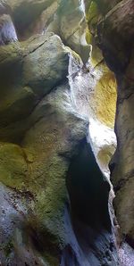 Aerial view of river flowing through rocks