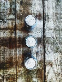 Directly above shot of cans on table