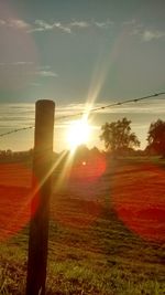 Scenic view of landscape at sunset