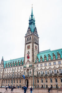 View of buildings in city against sky