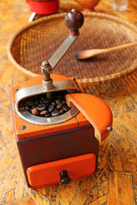 High angle view of old machine on table