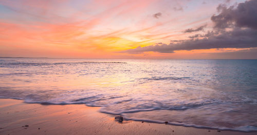 Scenic view of sea against sky during sunset