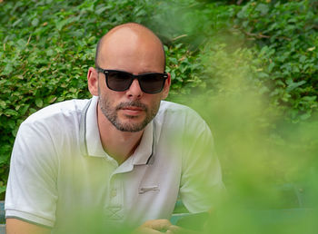 Portrait of young man wearing sunglasses