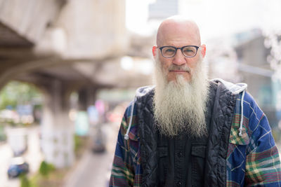 Portrait of man standing outdoors