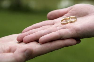 Cropped hand of person with pills