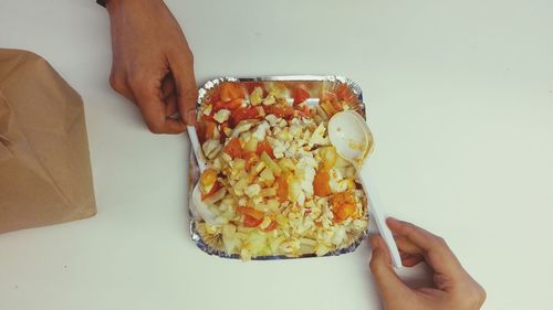 Cropped image of person preparing food