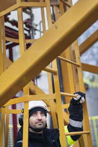 Engineer at building site looking away