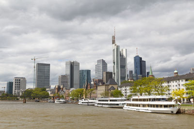 Modern buildings in city against sky