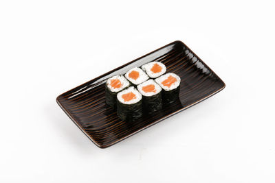 High angle view of sushi against white background