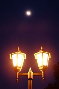 Low angle view of lamp post against clear sky