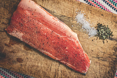 High angle view of meat on cutting board