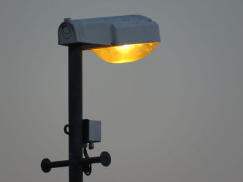 Close-up of street light against clear sky