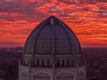 Low angle view of church against sky during sunset