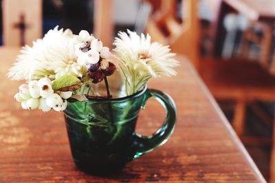 Close-up of flower vase on table