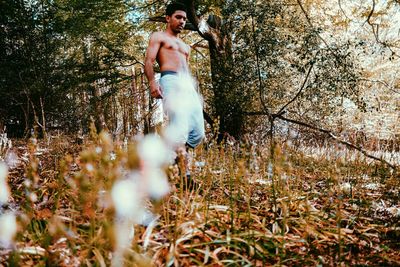Young woman in forest
