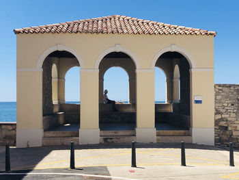 View of historic building against clear blue sky