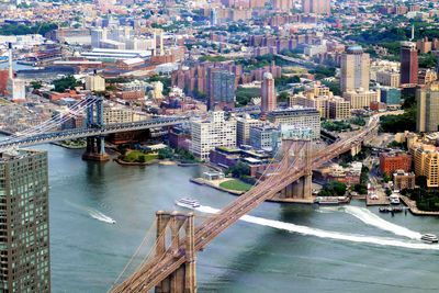High angle view of river amidst buildings in city