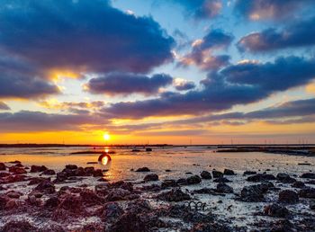 Scenic view of sea against sky during sunset