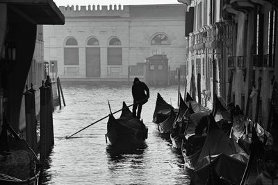 People on boat in a building