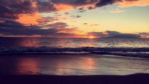 View of calm sea at sunset