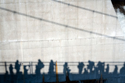 Shadow of people on wall