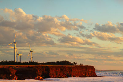 Scenic view of sea against sky at sunset