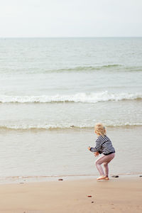 Full length of girl on beach