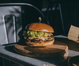 Close-up of burger on cutting board