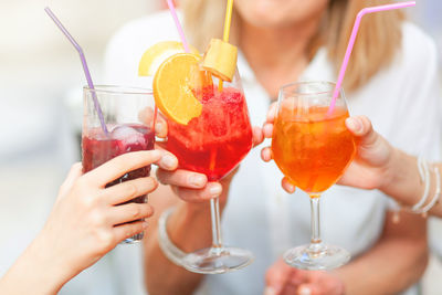 Close-up of woman drinking glass