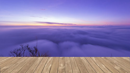 Scenic view of landscape against sky at sunset