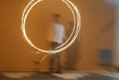 Blurred motion of man at night