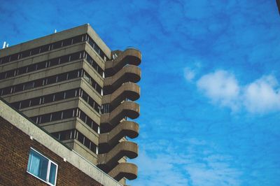 Low angle view of building against blue sky