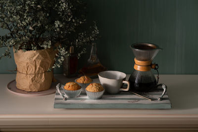 Coffee cup on table at home