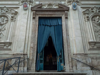 Low angle view of closed door of building