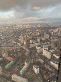 High angle view of buildings in city against sky