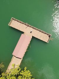 High angle view of built structure by lake