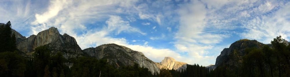 Panoramic view of rocky mountains against sky