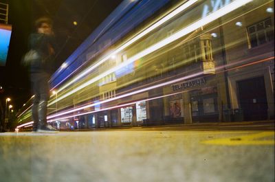 Train at railroad station at night