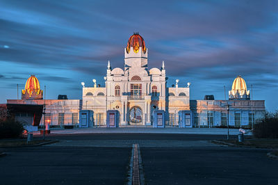 View of historic building against sky at dusk