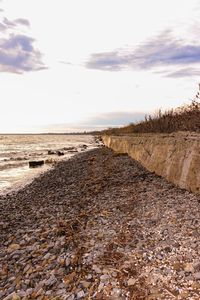 Surface level of beach against sky