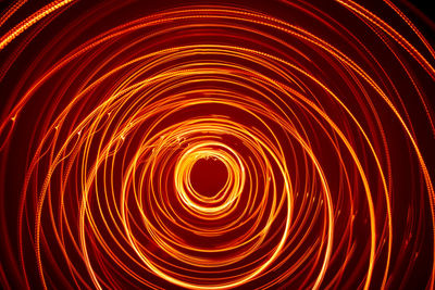 A beautiful, bright light swirl of colors. futuristic light painting on a black background. 