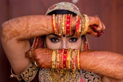 Portrait of young bride in traditional clothing 