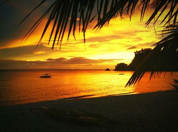 Scenic view of sea at sunset