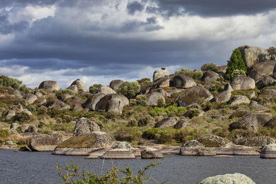 Scenic view of rock formations against sky