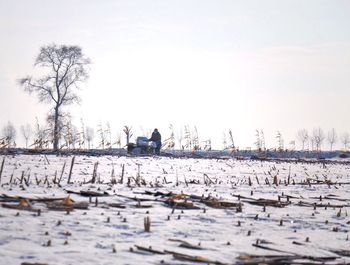 Scenic view of sea against sky during winter