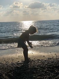 Boy playing on beach