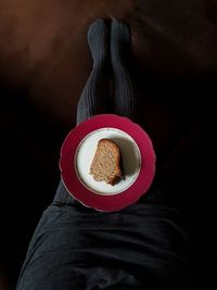 High angle view of plate with cake on legs