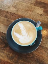 High angle view of cappuccino on table